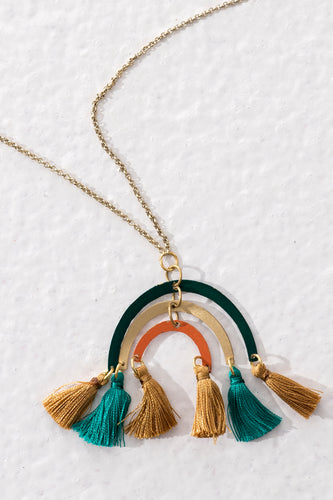 Ethical long necklace with brass rainbow-like pendant and multi-coloured tassels. Handmade in India.