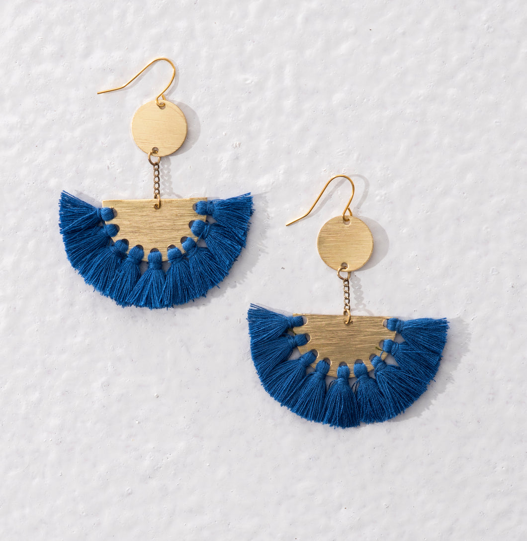 Golden brass drop earrings with royal blue tassels. Statement ethical jewellery available in the UK